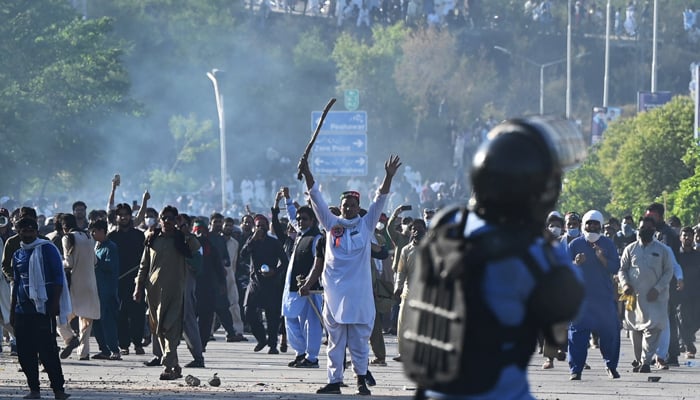 People protest outside the police headquarters in Islamabad. — AFP/File