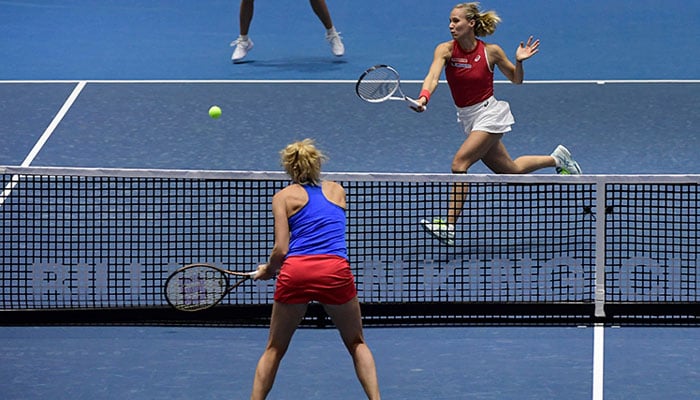 Switzerland’s Viktorija Golubic returns to Czech Republic’s Katerina Siniakova during the group stage group A doubles tennis match between Switzerland and Czech Republic on the day 1 of the Billie Jean King Cup Finals 2023 in La Cartuja stadium in Seville on November 7. —AFP