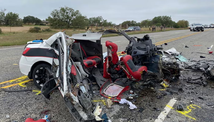 Mangled vehicles at the scene of crash, on 8 November 2023, near Batesville, Texas. — The Guardian