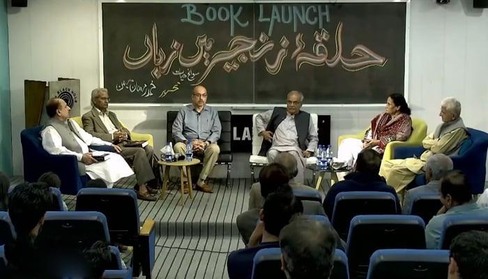 This still taken from a video released on November 11, 2023, shows participants during a book launch ceremony of Ramzan Memon ‘Halqa-e-zanjeer main zubaan’. — YouTube/The Black Hole