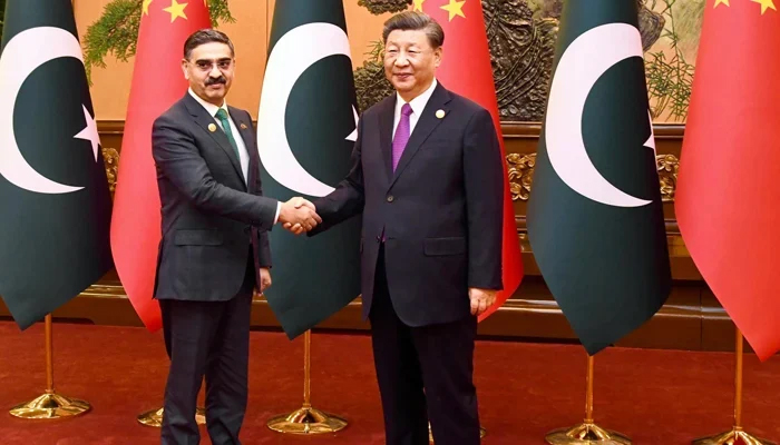 Caretaker PM Anwaar-ul-Haq Kakar shakes hands with Chinese President Xi Jinping at the Great Hall of People on the sidelines of the Third Belt and Road Forum being held in Beijing on October 19, 2023. — X/@GovtofPakistan