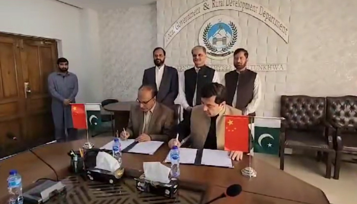 Secretary Local Council Board Mian Shafiqur Rehman (R) and Administrator of China Window Amjad Aziz Malik during the signing of the MoU on November 12, 2023, in this still. — Facebook/China Window