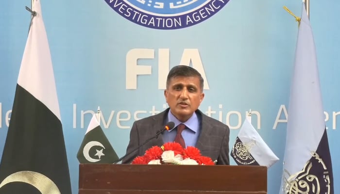 Former Federal Investigation Agency director general Dr Sanaullah Abbasi speaks during a lecture in this still taken from a video released on October 22, 2021. — Facebook/Group Development Pakistan