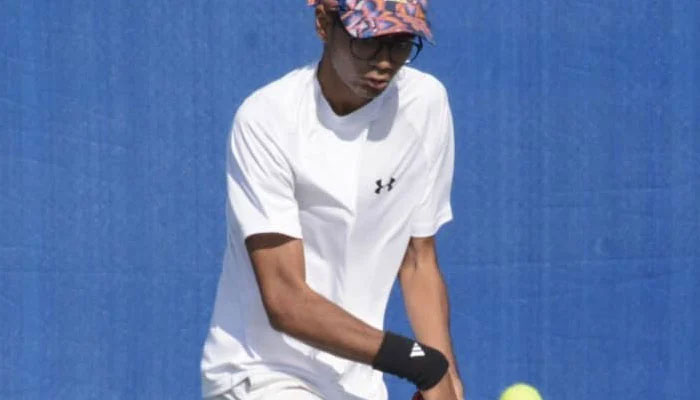 The image shows one of the participants of the ITF Pakistan J30 World Junior Tennis Championships II as the event entered the semis stage at the PTF-SDA Tennis Complex. —x/PAKTENNIS