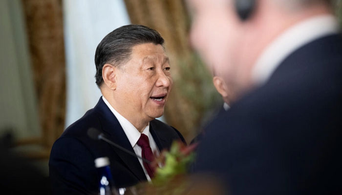 Xi told Biden that China did not seek to surpass or unseat the United States, — AFP