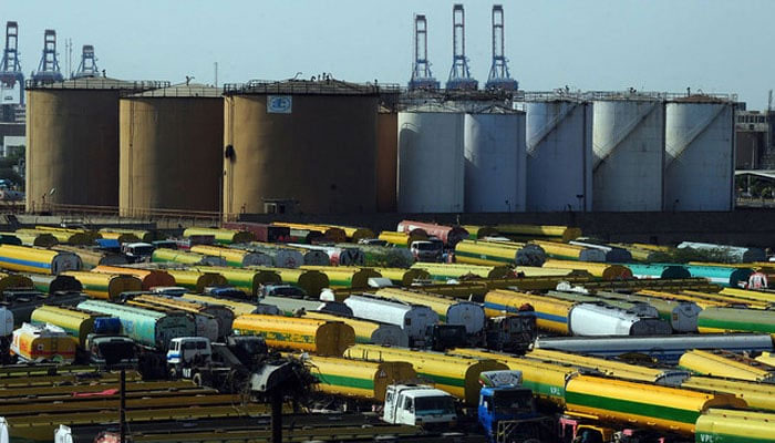 In this photo, an overview shows tankers parked outside a local oil refinery in Pakistans port city of Karachi. AFP/File