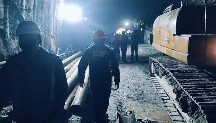 Rescue efforts have been slowed by debris continuing to fall. — AFP File