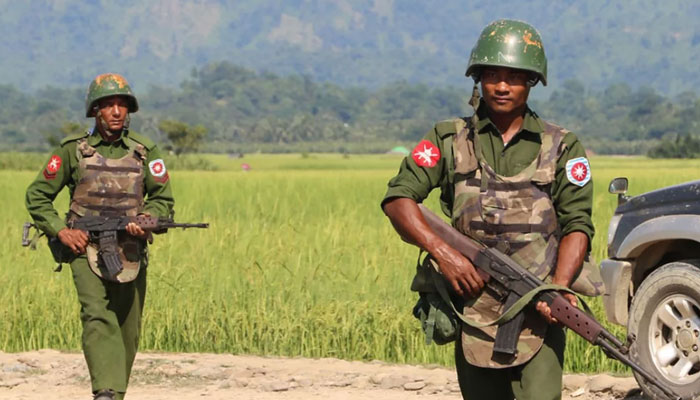 Armed Myanmar army soldiers patrol a village in Maungdaw located in Rakhine State on October 21, 2016. —AFP File
