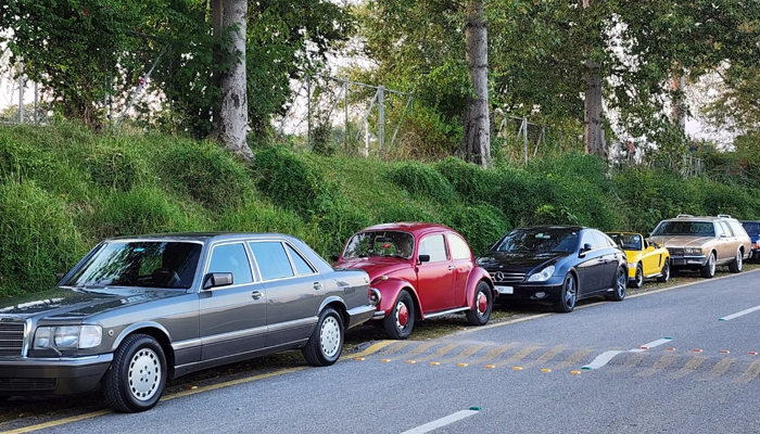 This image released on November 17, 2023, shows a number of classic cars in KP that came from Karachi in a car rally.— Facebook/Volkswagen Club of Pakistan (VWCOP)
