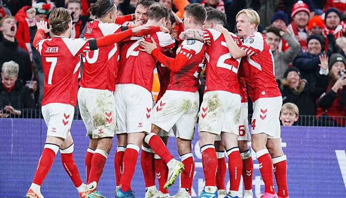 Denmark celebrate their winning goal against Slovenia.  —AFP File