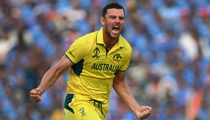 Josh Hazlewood celebrates after taking the wicket of Indias Ravindra Jadeja during the 2023 ICC Cricket World Cup ODI final between India and Australia in Ahmedabad on November 19, 2023. — AFP
