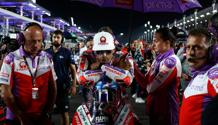 Prima Pramacs Spanish rider Jorge Martin takes his position on the starting grid ahead of the Moto GP Grand Prix of Qatar at the Lusail International Circuit, in the city of Lusail on November 19, 2023. — AFP