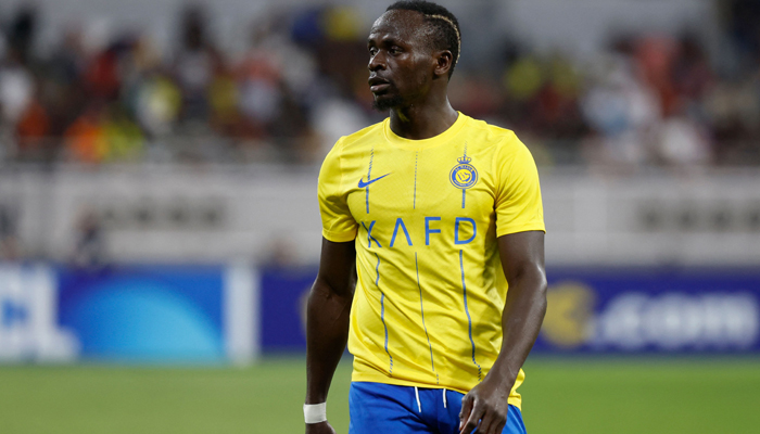 Nassrs Senegalese Forward Sadio Mane looks on during the AFC Champions League Group E football match between Qatars al-Duhail and Saudias al-Nassr in Doha on November 7, 2023. — AFP