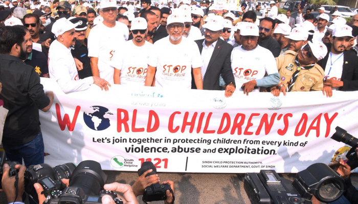 Caretaker Sindh CM Justice (R) Maqbool Baqar leads a Walk organised by the Sindh Child Protection Authority of the Social Welfare Department to commemorate World Childrens Day at Seaview on November 19, 2023. — X@SindhCMHouse