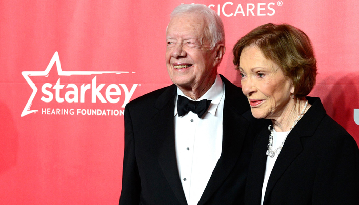 Former President Jimmy Carter (L) and former First Lady Rosalynn Carter attend the 25th anniversary MusiCares 2015 Person Of The Year Gala at the Los Angeles Convention Center on February 6, 2015. — AFP