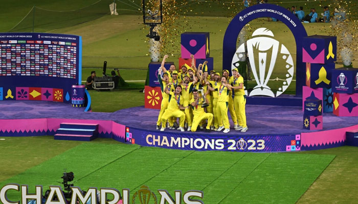 Future imperfect? Australias players celebrate with the trophy on Sunday after beating India in the final. — AFP File