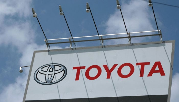 The logo of Japans Toyota Motor at a company dealership in Tokyo, Japan, Aug. 6, 2020. — AFP File