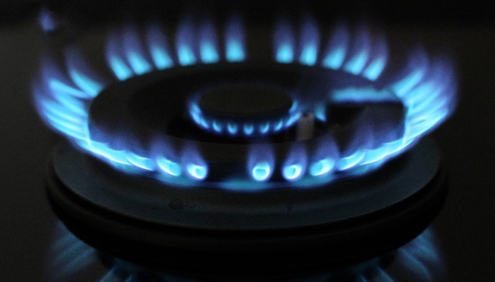 This representational image shows a stove lit up. — AFP