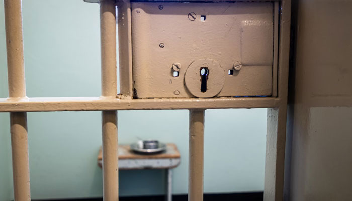 A representational image of a jail. — Unsplash