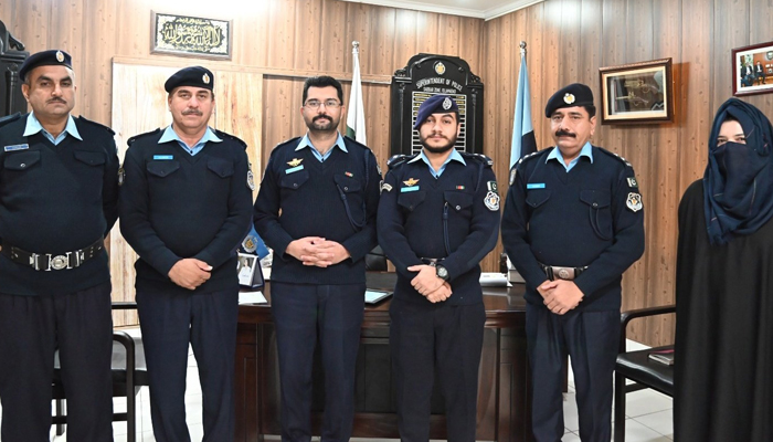 The DPO Saddar Zone Nosherwan Ali (3rd-R) can be seen pictured alongside the police team on November 23, 2023. — X/@ICT_Police