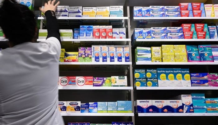 A representational image of a person in a pharmacy store. — AFP/FIle
