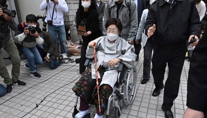 Lee Yong-soo, who was forced to serve as a sex slave for Japanese troops during World War II, leaves after a ruling at the Seoul Central District Court on April 21, 2021.  — AFP File