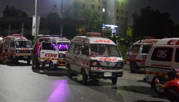 This image shows multiple ambulances parked on a road. — AFP/File