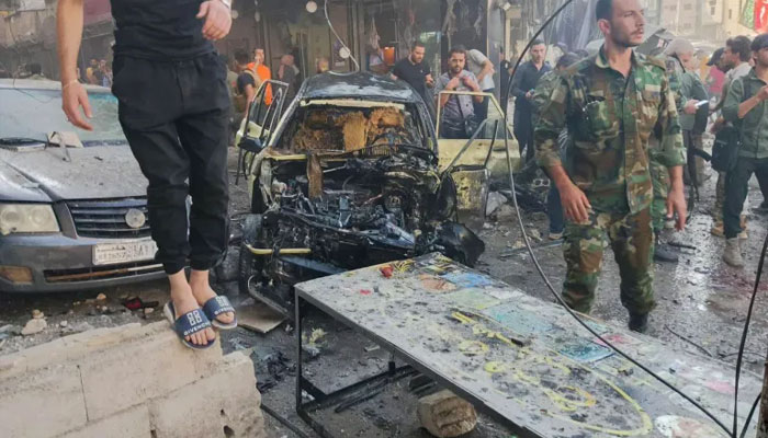People gather at the site of an explosion in the town of Sayeda Zeinab on the outskirts of Damascus, Syria on July 27, 2023. —AFP File