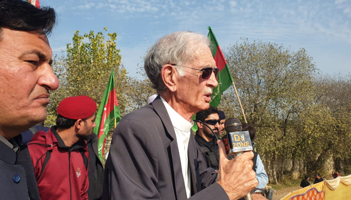 Pakistan Tehreek-e-Insaf-Parliamentarians (PTIP) leader Pervez Khattak speaks with the workers in KP on November 25, 2023. — Facebook/PTI-P