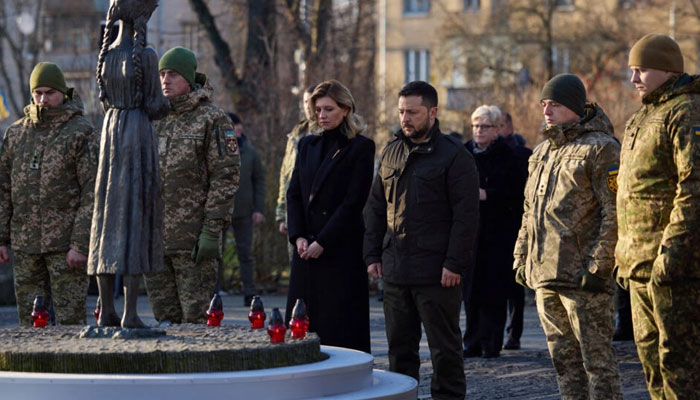 Ukraines President Volodymyr Zelensky and his wife Olena Zelenska (C-L) paid tribute to the victims of the famine of 1932-1933 at the National Museum of the Holodomor in Kyiv, Ukrainian, on 25 November 2023. —AFP File