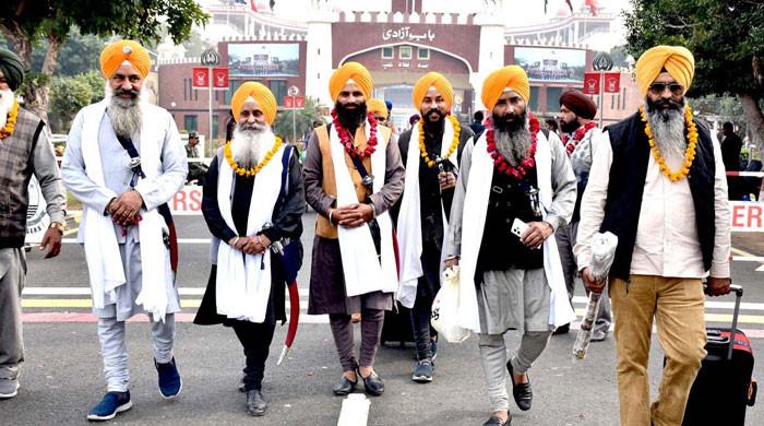 Sikh devotees arrive to celebrate birth anniversary of Guru Nanak - Vimarsana News
