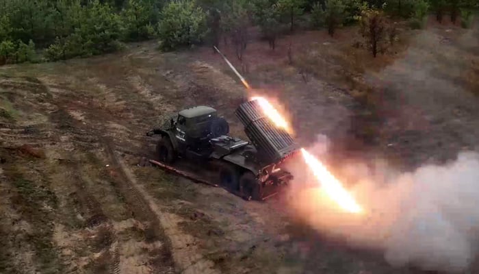 This still made from footage on November 7, 2023, shows Russian troops firing a multiple rocket launcher at an undisclosed location, reportedly in Ukraine. — AFP