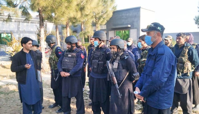 KP Police officials stand as an officer talks to the personnel in this image on November 27, 2023. — Facebook/Khyber Pakhtunkhwa Police