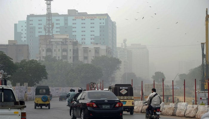 In this file photo, heavy smog conditions are pictured in Karachi on November 14, 2018. — AFP
