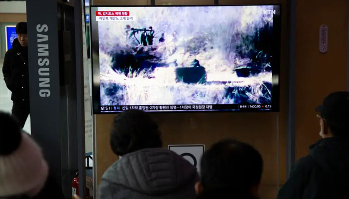 People watch a TV monitor displaying daily news at a station in Seoul, South Korea, 27 November 2023. — EFE-EPA/JEON HEON-KYUN