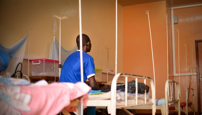 A patient with an advanced stage of Acquired Immunodeficiency Syndrome (AIDS) is treated at the community hospital in Bangui, Central African Republic, on Jan. 27, 2022. — AFP File