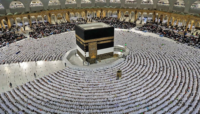 Muslim worshippers pray around the Kaaba at the Grand Mosque in Saudi Arabias holy city of Makkah on July 5, 2022. — AFP