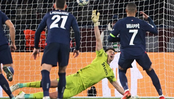 Kylian Mbappes stoppage-time penalty rescued a draw for PSG against Newcastle. — AFP