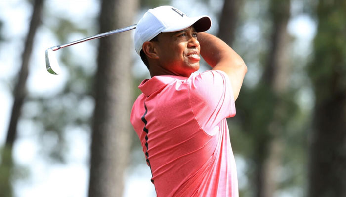 Tiger Woods says he is pain-free in his surgically repaired right ankle and curious about his form this week as he makes his competitive return at the Hero World Challenge. — AFP