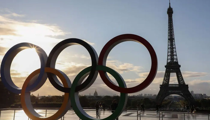 In this file photo taken on September 14, 2017 The Olympic rings installed on the Esplanade du Trocadero near the Eiffel tower following the Paris nomination as host for the 2024 Olympics in Paris.  . — AFP