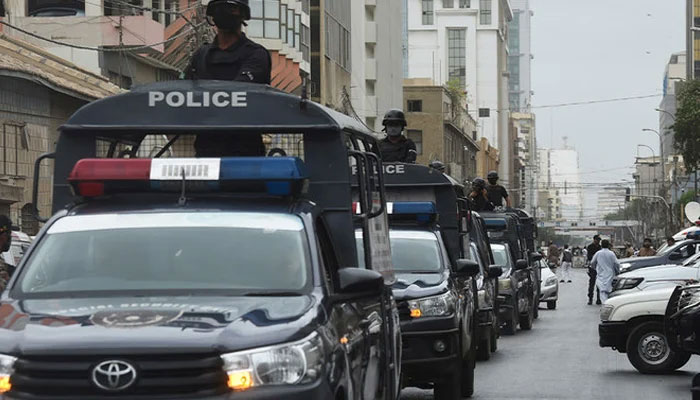 The Sindh Police vehicles can be seen in this image. — AFP/File