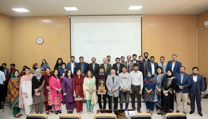 Participants stand for a group photo during a seminar held at GC University Lahore to commemorate World Fisheries Day on November 29, 2023. — Facebook/GC University Lahore