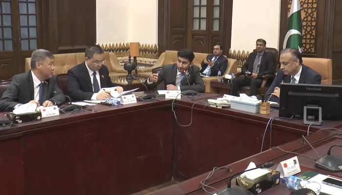 Punjab Chief Secretary Zahid Akhtar Zaman chairs a meeting as an official briefs the Chinese delegation in this still on November 29, 2023. — Facebook/Chief Secretary Punjab