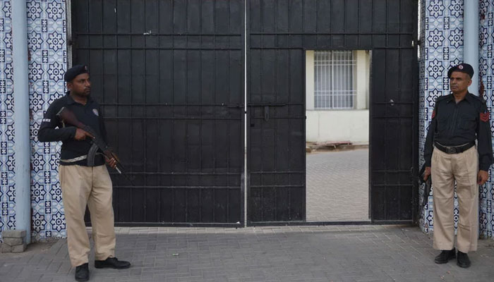 Policemen stand guard outside the Anti-Terrorism Court in Karachi. —AFP/File