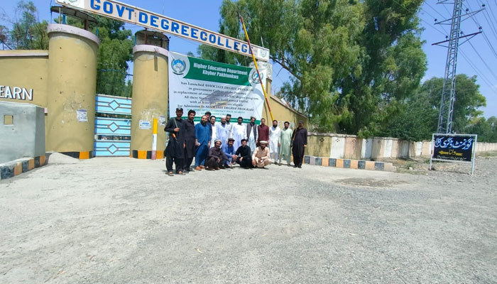 In this picture, people stand outside the government degree college Wana on June 1, 2023. —Facebook/Govt Degree College WANA South Waziristan District