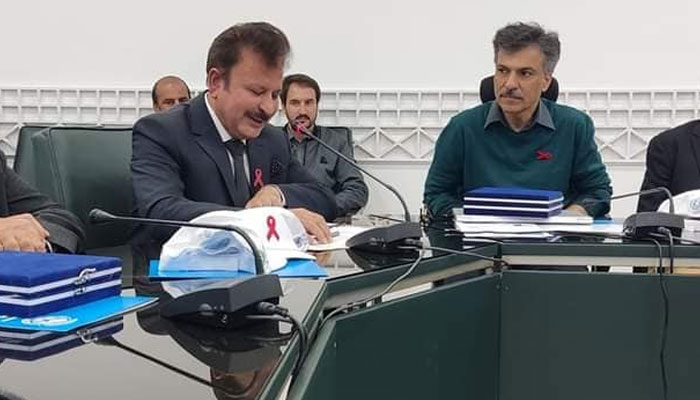 Director General of Health Services Dr. Shaukat Ali (L), sits during the occasion of World AIDS Day at  Hayatabad Medical Complex, Peshawar on  December 1, 2023. —Facebook/Dr Shaukat Ali