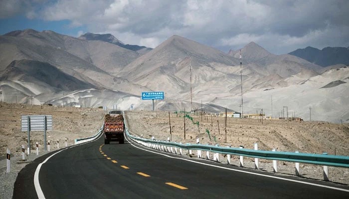 A truck drives along the China-Pakistan Friendship Highway before the Karakorum mountain range near Tashkurgan in Chinas western Xinjiang province. — AFP/File