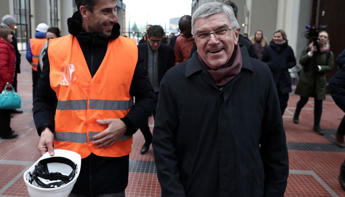 IOC head Thomas Bach (R) and president of the Paris 2024 Organising Committee for the Olympic and Paralympic Games, Tony Estanguet (L). —AFP File