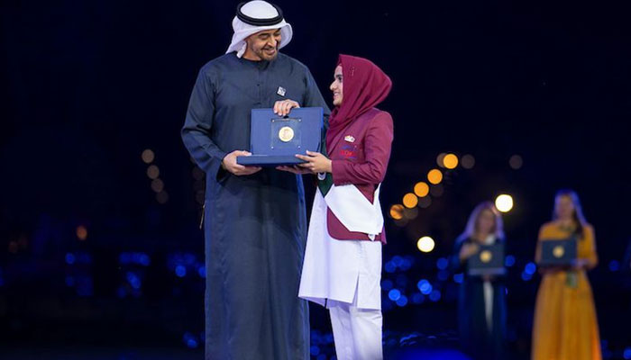 President His Highness Sheikh Mohamed Bin Zayed Al Nahyan awards Zayed Sustainability Prize to Sumiya Bibi, an orphan student at KORT Education in Pakistan. — UAE Presidential Court