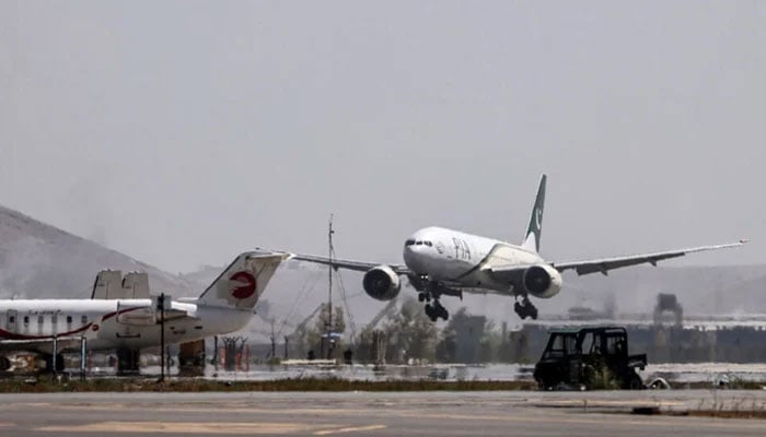 The Pakistan International Airlines (PIA) aircraft can be seen landing. — AFP/File